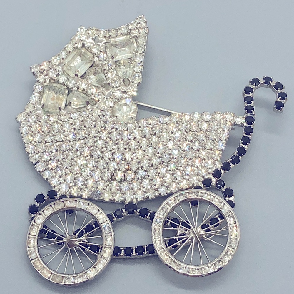 Vintage Dorothy Bauer baby carriage brooch